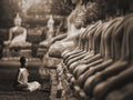 Young Buddhist Monk praying, Thailand (sepia) — Pangea Images